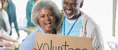 P2-active-senior-couple-volunteer P2-active-senior-couple-volunteer