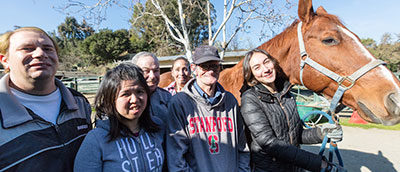 PANEL-day-services Hope clients and staffer with a horse